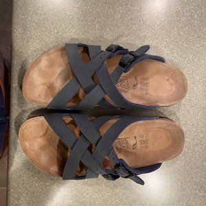 Birkenstock pink patterned sandals.